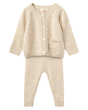 Beige baby cardigan and pants set on a white background