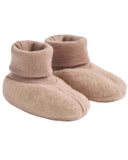 Pair of beige baby booties on a white background