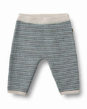 Wool knit baby trousers in bluey speckled melange with cream ribbed waistband and cuffs, front flat lay