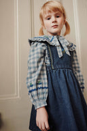 Blue and white plaid baby blouse with embroidered flat collar, lifestyle photo