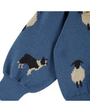 Dusty blue jacquard cardigan with white sheep and border collie pattern and ruffle collar, additional view
