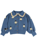 Dusty blue jacquard cardigan with white sheep and border collie pattern and ruffle collar, additional view