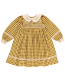 Golden green check cotton dress with smocked bodice, cream Peter Pan collar embroidered with pink roses, flat lay on white background