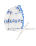 White bonnet with blue and grey flower stripe print and blue crochet edge trim, side view