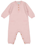 A light pink long-sleeve baby romper with a buttoned henley neckline, two front pockets, and snap closures on the legs, shown flat on a white background.