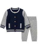 Navy and grey cashmere letterman jacket with striped trim and wooden buttons, matching heathered grey leggings, flat lay
