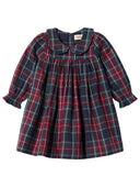 A toddler girl's long-sleeve plaid dress with a smocked bodice and ruffled collar, shown flat on a white background. The dress features a navy blue base with red and green plaid lines.
