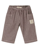 Dark brown and white pinstripe baby pants with side pockets and MarMar Copenhagen brand patch, flat lay
