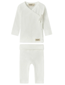 A two-piece baby outfit set in off-white ribbed cotton, featuring a long-sleeve wrap-style top with a side tie and matching pants, shown on a plain white background.