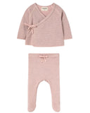 A two-piece baby clothing set featuring a long-sleeve wrap top and matching footed pants in a dusty pink and white striped knit fabric, displayed on a solid white background.