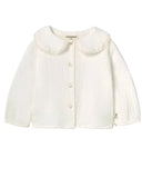 White textured baby quileted top with peterpan collar on a white background